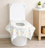 Toilet with a floral seat cover in a bathroom setting
