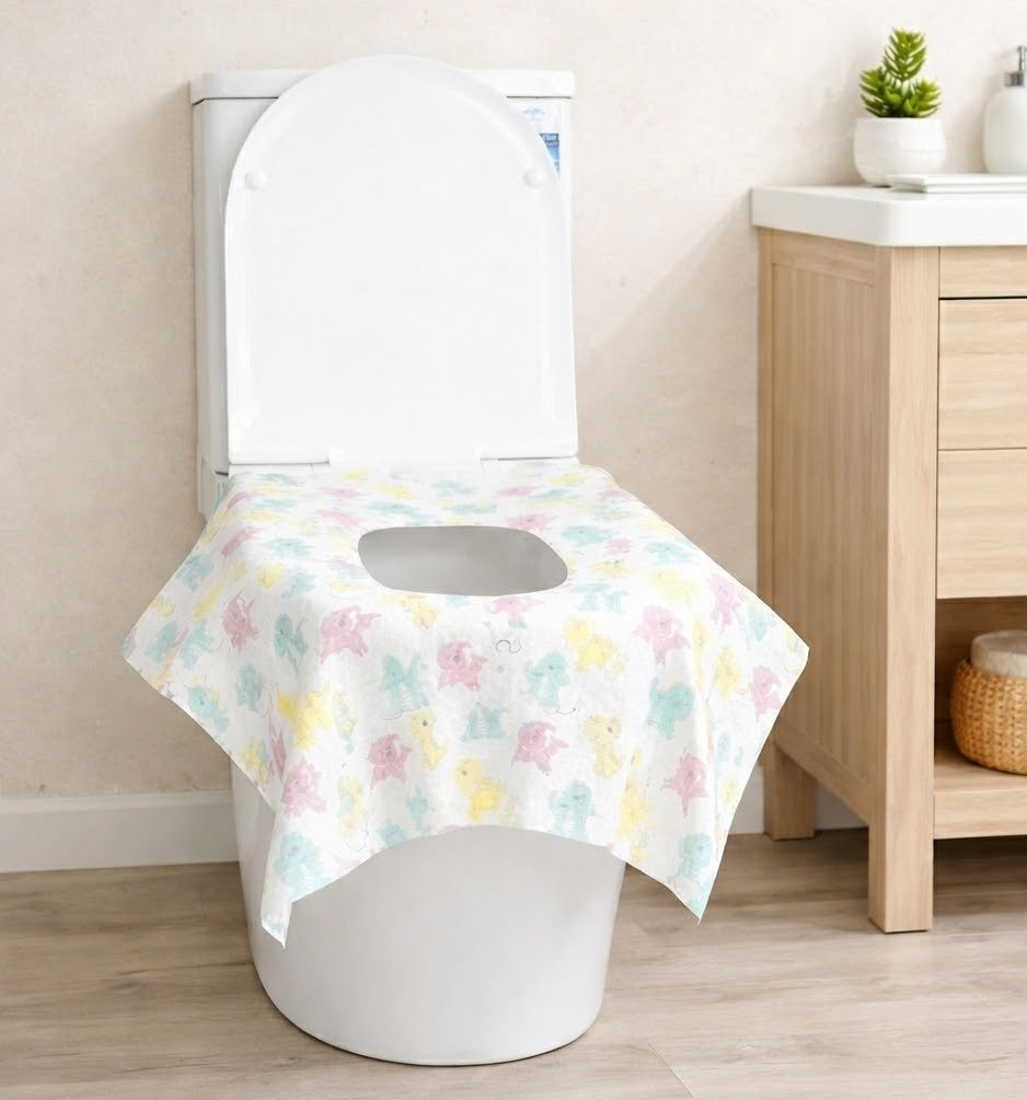 Toilet with a floral seat cover in a bathroom setting